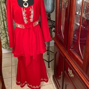 Red skirt set with gold trim